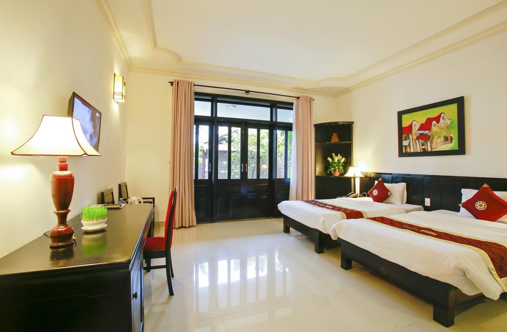 Hoi An Red Frangipani Villa Chambre photo
